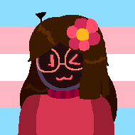 0xC74E, a robot girl with [a visor, an antenna, brown hair], wearing [a red sweater, orange circular glasses]. it is winking and standing in front of the transgender flag.